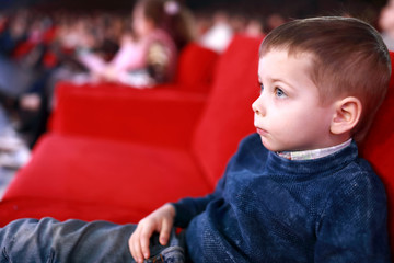 Kid in concert hall