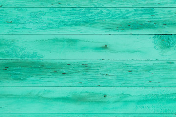 old shabby planks with cracks, green tint, grunge, texture, background 