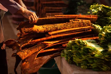 Foto op Aluminium Cinnamon bark at a local market in Laos. © Tanes