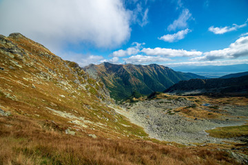 Fototapeta na wymiar rocky Tatra mountain tourist hiking trails under blue sky in Slovakia