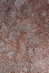 The wall of the old rusty metal grill on the street