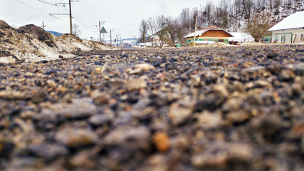 Worm view of asphalt road in winter season.