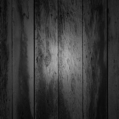 black and white old shabby vertical planks with stains, grunge, texture, background with vignetting 