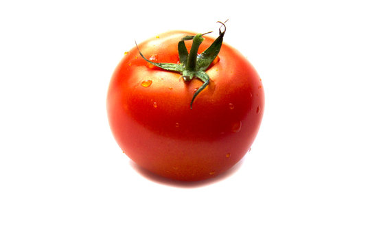 Tomato.Tomatoes. Whole and a half isolated on white. Ripe red tomatoes. Tomato vegetables. Top view.