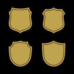 Shield shape gold icons set. Simple flat logo on black background. Symbol of security, protection, safety, strong. Element badge for protect design emblem decoration Vector illustration