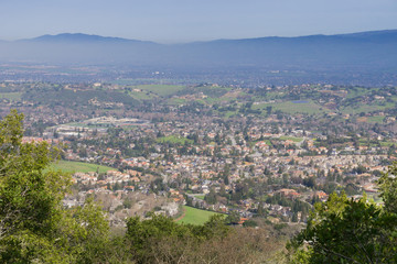 Fototapeta na wymiar View towards a residential neighborhood in San Jose from the hills of Almaden Quicksilver County Park, south San Francisco bay, California