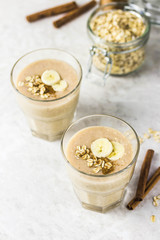 Peanut butter oatmeal breakfast smoothie. Selective focus, space for text.
