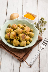 vegetarian meatballs with potatoes tumeric and green olives