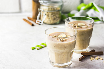 Peanut butter oatmeal breakfast smoothie. Selective focus, space for text.