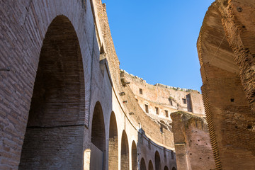 Arches of the Colosseum at the bend of different levels.