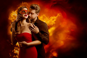 Couple Hot Flaming Kiss, Man in Love Kissing Seductive Dreaming Woman in Fantasy Red Sexy Mask