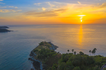 aerial photography sunset above the great lighthouse at Promthep cape Phuket Thailand