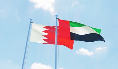 UAE and Bahrain, two flags waving against blue sky. 3d image