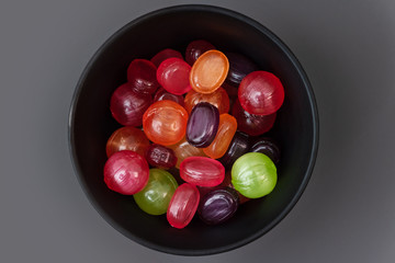 The colorful candies in a bowl.