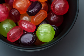 The colorful candies in a bowl.