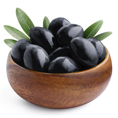 Delicious black ripe olives in a wooden bowl, isolated on white background