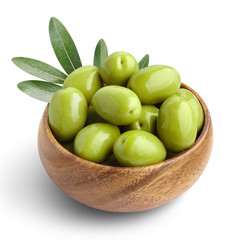 Delicious green ripe olives in a wooden bowl, isolated on white background