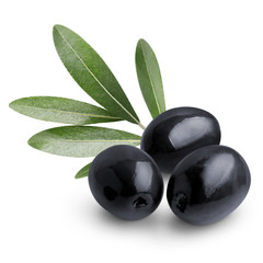 Delicious black olives with leaves, isolated on white background