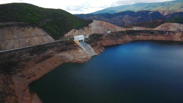 Aerial. Portuguese hydroelectro dam Odelouca, in mountains of Monchique. Algarve Portugal