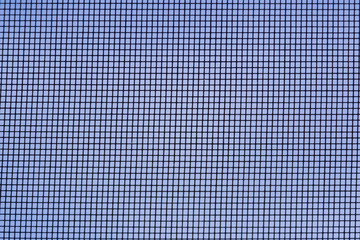 Mosquito net on a blue sky background