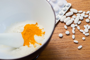 Herbs powder in the mortar and pestle