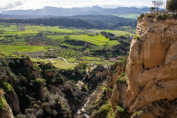 Fototapeta na wymiar Paisaje de Andalucía con distintos tonos de verde, visto desde la altura