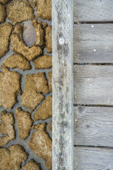 Wooden walkway and dried mud in the background, Alviso marsh, south San Francisco bay, California