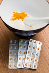 Herbs powder in the mortar and pestle