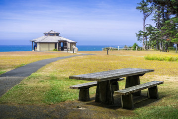 Pavilion on the shoreline of the Pacific Ocean on a sunny summer day, Shores Acres State Park, Coos Bay, Oregon