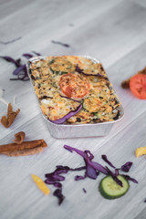 vegetables and meat together baked in box to take away