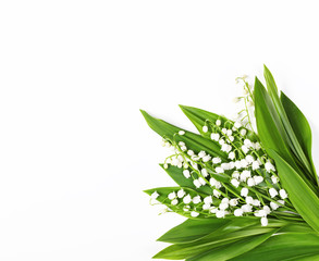 Beautiful bouquet of lilies of the valley isolated on white background. Top view with copy space. Flat lay