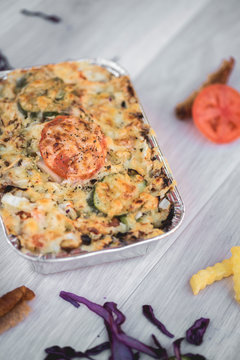 vegetables and meat together baked in box to take away