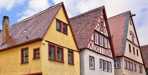 Traditional German architecture. Top of ancient half-timbered housse in a medieval old town. Germany. Bavaria. Rothenburg ob der Tauber.