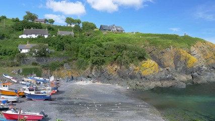 Panorama of the beautiful, traditional seaside fishing village - Cadgwith Cove, Cornwall, England.