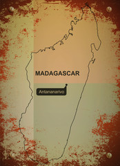 Madagascar map on metal background, texture, blurred image, dirty