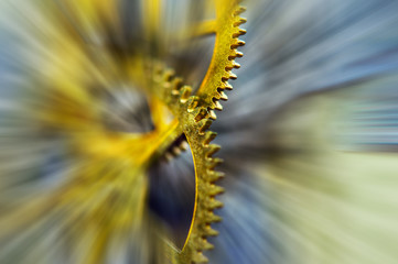 Metal Cogwheels in clock mechanism , abstract sun beams, Concept Movement is life, Teamwork , Idea Technology, Infinity, Time. Macro