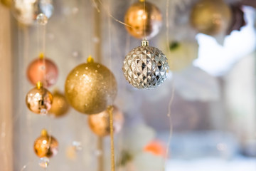 Christmas decoration in the shop windows. Christmas tree balls	