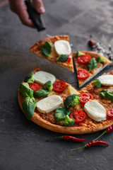 pizza with vegetables and cheese (broccoli, mozzarella basil and others). food background