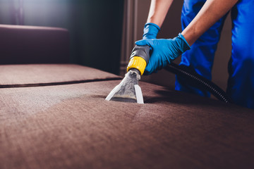 Sofa chemical cleaning with professionally extraction method. Upholstered furniture. Early spring...