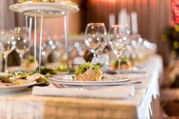 Serving dishes in the restaurant. luxury dinner served on the table © nikolaskus