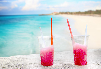 Two strawberry drift-ice on the beach. This is situated in tropical resort in Cuba.