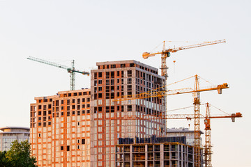 construction cranes and high-rise building