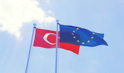 Turkey and European Union, two flags waving against blue sky. 3d image
