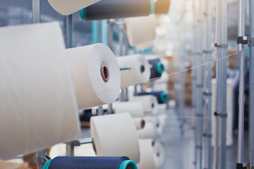 Knitted fabric. Textile factory in spinning production line and a rotating machinery and equipment production company.