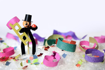 Karnawał, kominiarz na śniegu i kolorowym konfetti, party.