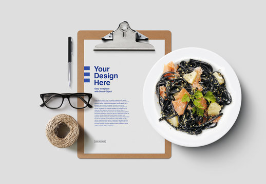 Clipboard with Food and Desk Accessories Mockup