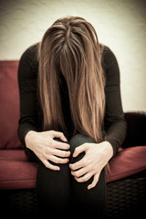 Abused, frightened woman in distress