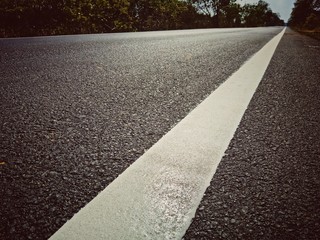Obraz premium asphalt road with lines