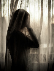 Abused, frightened woman in distress