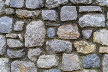 Old rustic stone wall - high quality texture / background